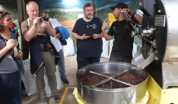 A group of people in a coffee tour