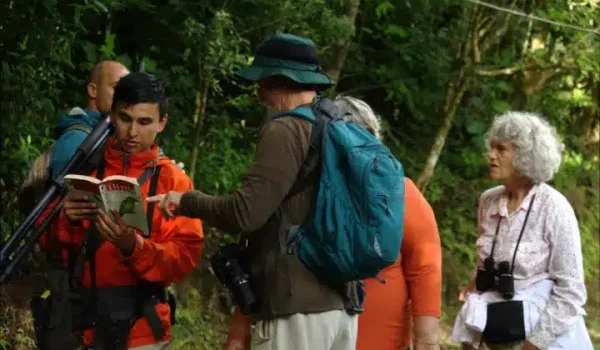 A group with a tour guide on a Monteverde Bird Watching Tour.