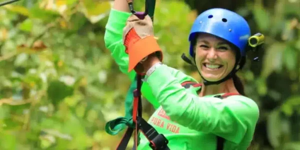 A girl in cloud forest zip line in Monteverde Costa Rica