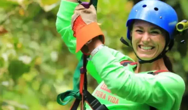 A girl in cloud forest zip line in Monteverde Costa Rica