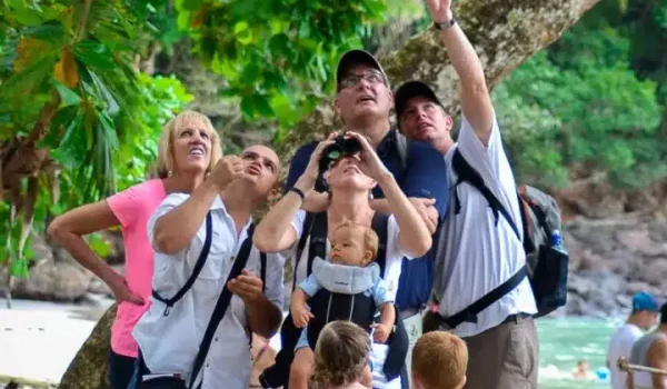 a group of people standing in front of a crowd
