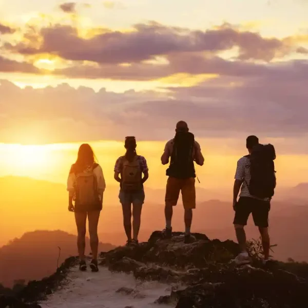 Monteverde Transportation customers watching the sunset at a shuttle stop.