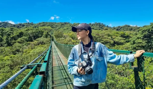 A tourist at Selvatura Hanging Bridges