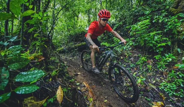 A Tourist at The Cloud Forest Monteverde Mountain E-Bike Tour