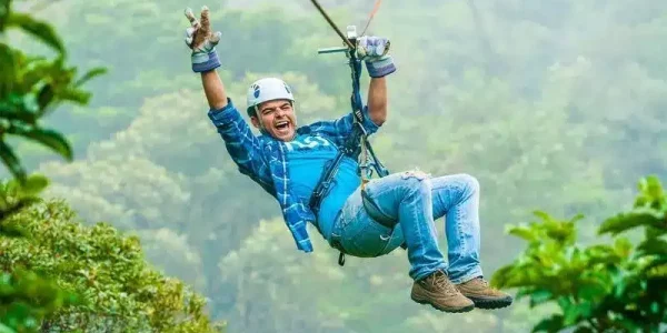 A man doing ziplines in Monteverde Costa Rica